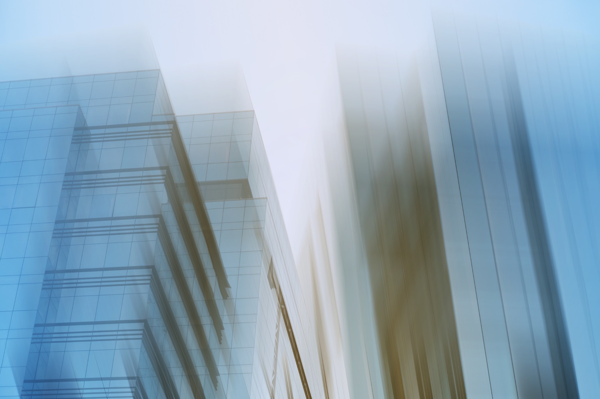 Glass office buildings seen from below